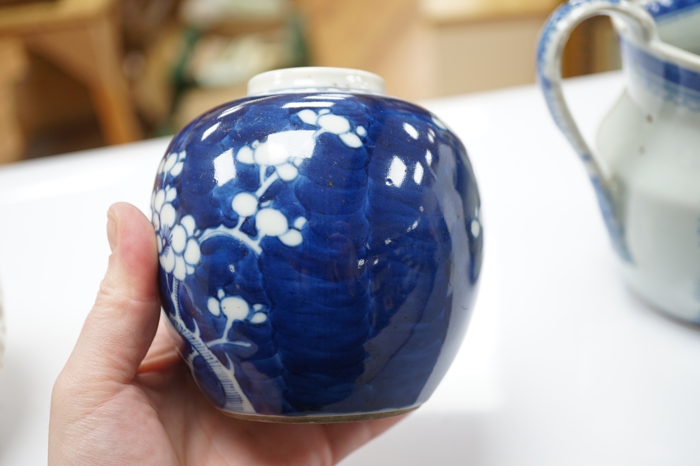 A 19th century Chinese blue and white jug, a similar jar and a pierced jar, tallest 15cm